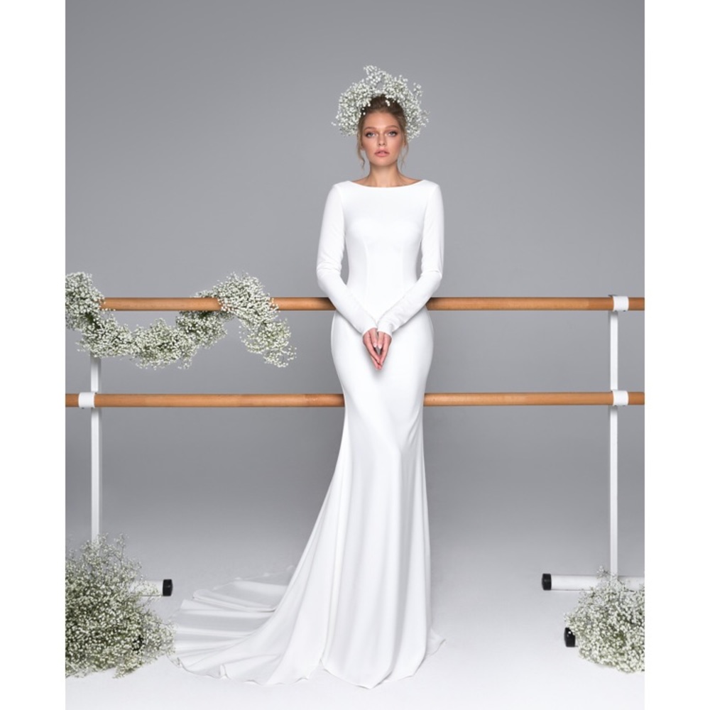 Elegant White Long-Sleeve Bridal Gown